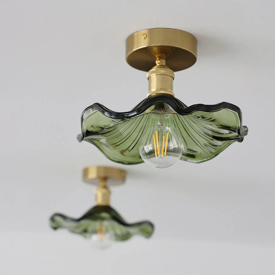 Ceiling decorative lamp with a glass leaf-shaped shade