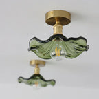 Ceiling decorative lamp with a glass leaf-shaped shade