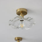 Ceiling decorative lamp with a glass leaf-shaped shade