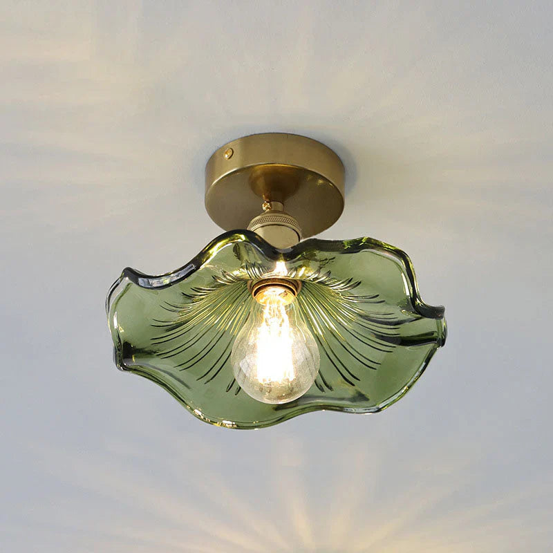 Ceiling decorative lamp with a glass leaf-shaped shade