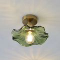 Ceiling decorative lamp with a glass leaf-shaped shade