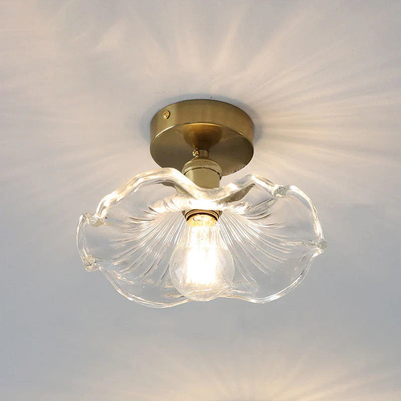 Ceiling decorative lamp with a glass leaf-shaped shade